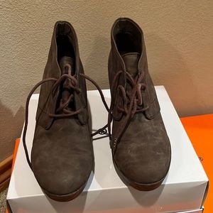 Pair of brown wedge heels lightly worn